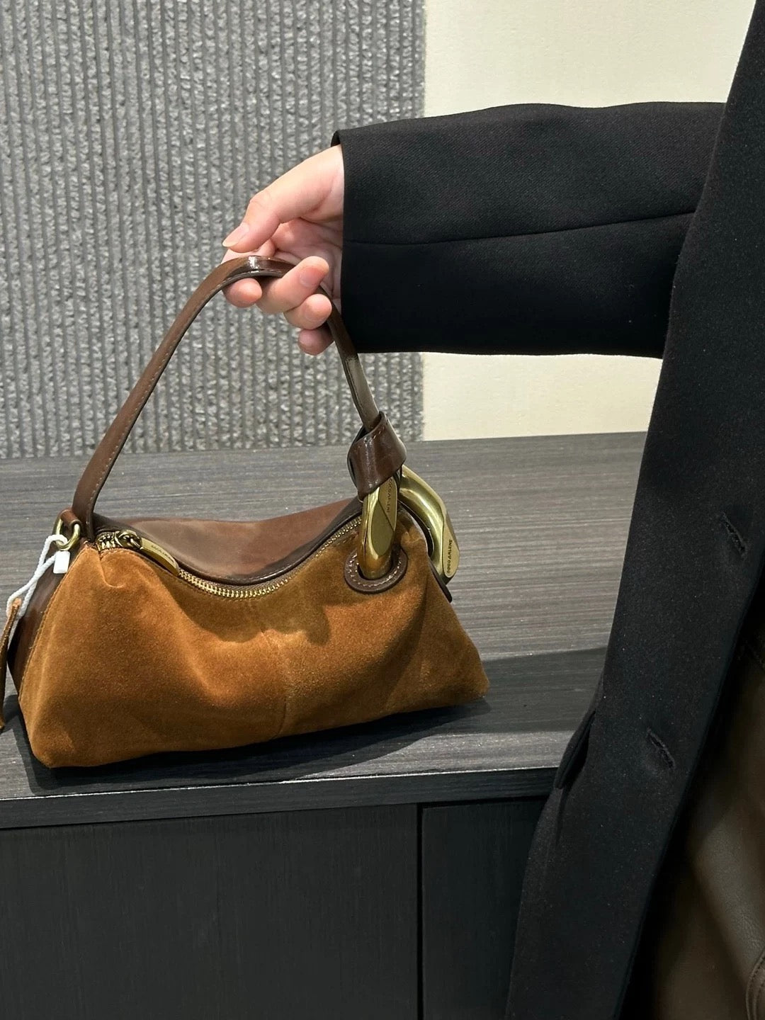 M087Real leather handbag